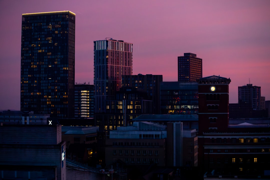 Modern glass office building at golden hour
