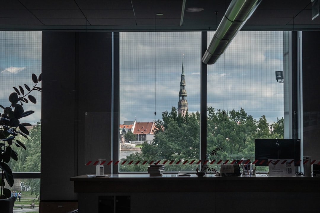 Modern office environment with warm lighting, representing professional advisory