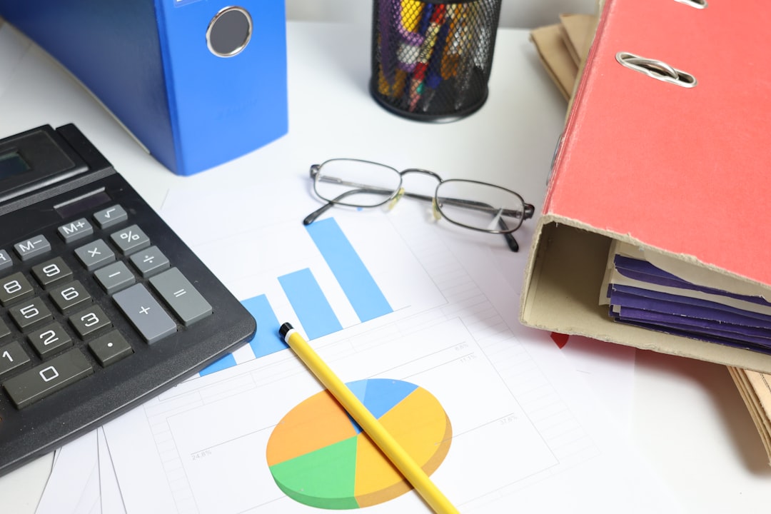 Financial analysis with spreadsheets and charts on a professional desk